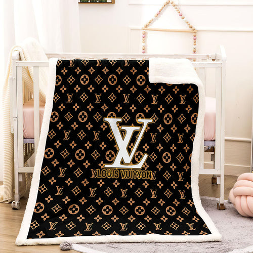White and dark brown louis Vuitton blanket 