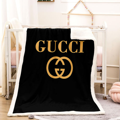 Brown logo Gucci throw blanket 