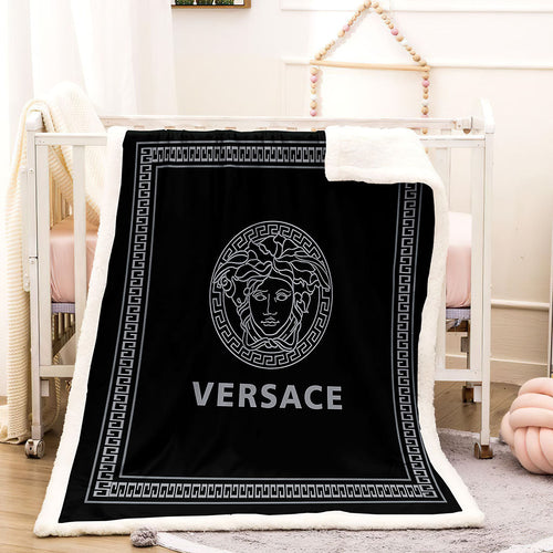 Black and gray Versace blanket  
