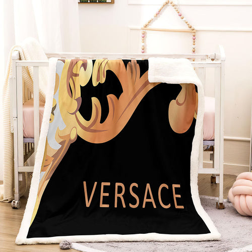 Black and gold Versace blanket 