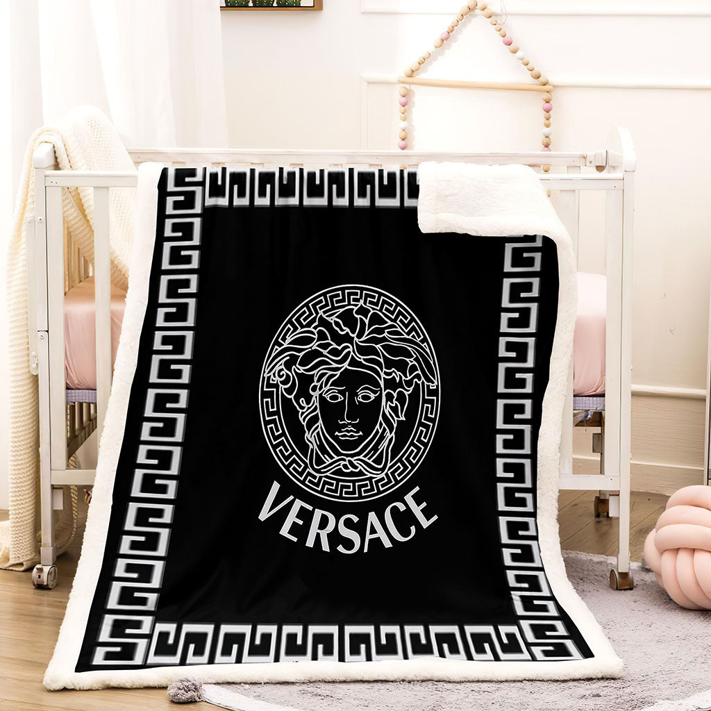 White and black Versace blanket 